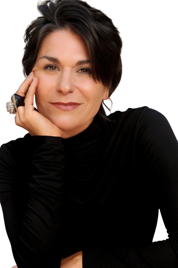 Debbi DiMaggio, midlife woman speaking about mindset, reinvention, and life transitions