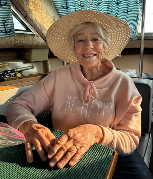 Nancy Jasin Ensley smiling warmly, author, retired nurse, and advocate for lifelong creativity and purpose.