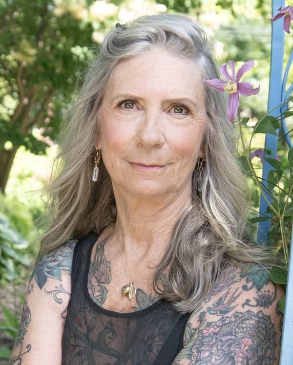 Portrait of Theresa Evans, ICU nurse, yoga teacher and author of Choosing to Die, discussing caregiving, anticipatory grief and compassionate end-of-life conversations on The Boomer Woman's Podcast.
